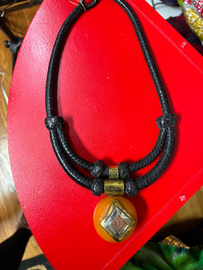 Black leather corded necklace with pendant