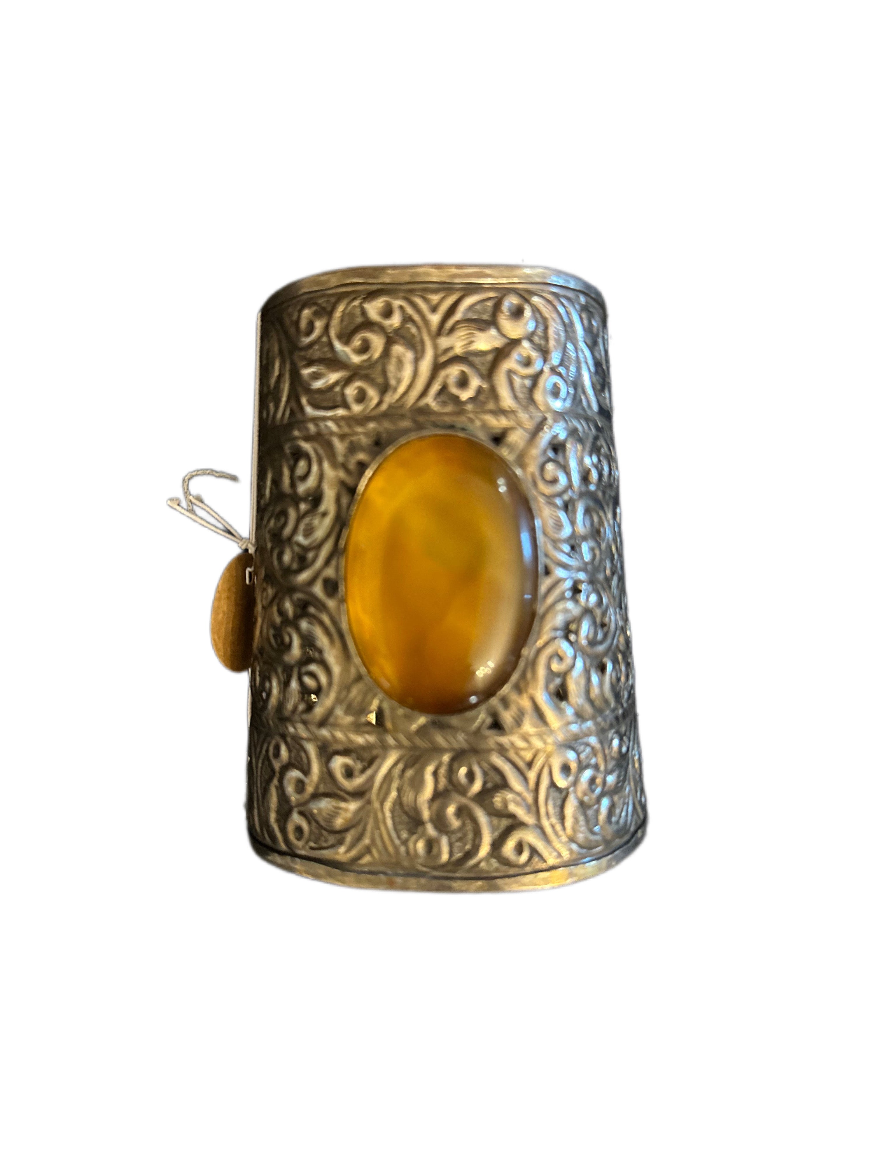 Large cuff bracelet with center stone